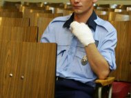 Agent de poliţie ameninţat cu strângerea de gât Marian Romanescu şi Ion Dan Chiparcă, propuşi pentru arestare 