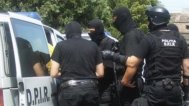 Păgubită, o companie de telefonie Percheziţii la Călăraşi, la membrii unei grupări suspectate de înşelăciuni