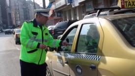 Taxiurile din zona aeroporturilor, verificate de poliţişti