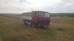 Un primar a încercat să calce un bărbat cu un camion. I-a avariat mașina și în spate și în față! (galerie foto) 