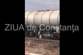 Au reapărut benzinarii Cum se fură în Constanţa, la Poarta 6, din vagoanele-cisternă (foto + video)  