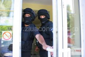 La această oră, percheziţii în Bucureşti şi patru județe, într-un dosar de spălare a banilor