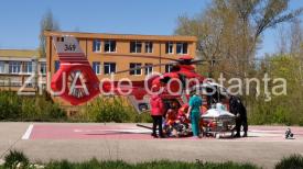 Imagini de la eveniment Tânăra arsă de la Sfântul Gheorghe, transferată cu elicopterul la Bucureşti (galerie foto) 