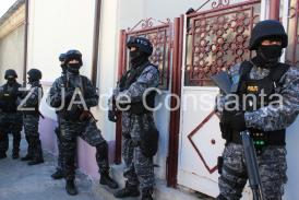 Cercetați pentru proxenetism și pornografie infantilă. Două persoane, reținute 