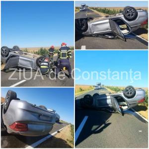 Mașină de București, răsturnată la ieșire din Saraiu. Două persoane au fost rănite (galerie foto)   