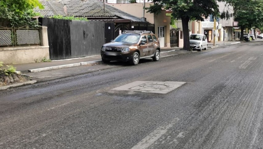 lucrările de asfaltare a carosabilului pe strada Poporului, foto: PMC 