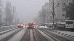 Atenție, șoferi! Ninsoarea din Constanța face drumurile alunecoase (FOTO+VIDEO)
