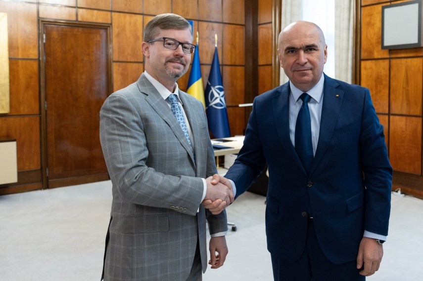 Premierul Ilie Bolojan și Michael Dickerson, însărcinat cu afaceri al Ambasadei Statelor Unite ale Americii în România, Foto: Facebook