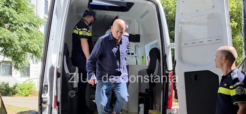 Executorul judecătoresc Vasile Deacu, adus la Palatul de Justiție