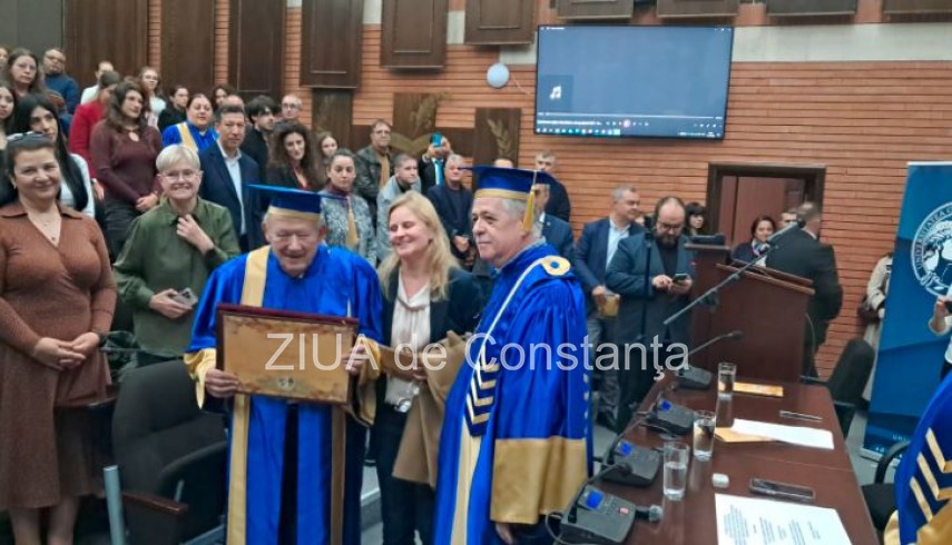 Istoricul polonez Adam Michnik, rectorul UOC, Dan Marcel Iliescu