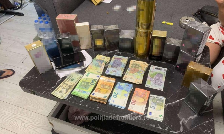 foto descinderi in bucuresti si patru judete produse contrafacute arme si zeci de mii de lei descoperite foto descinderi in bucuresti si patru judete produse contrafacute arme si zeci de mii de lei descoperite