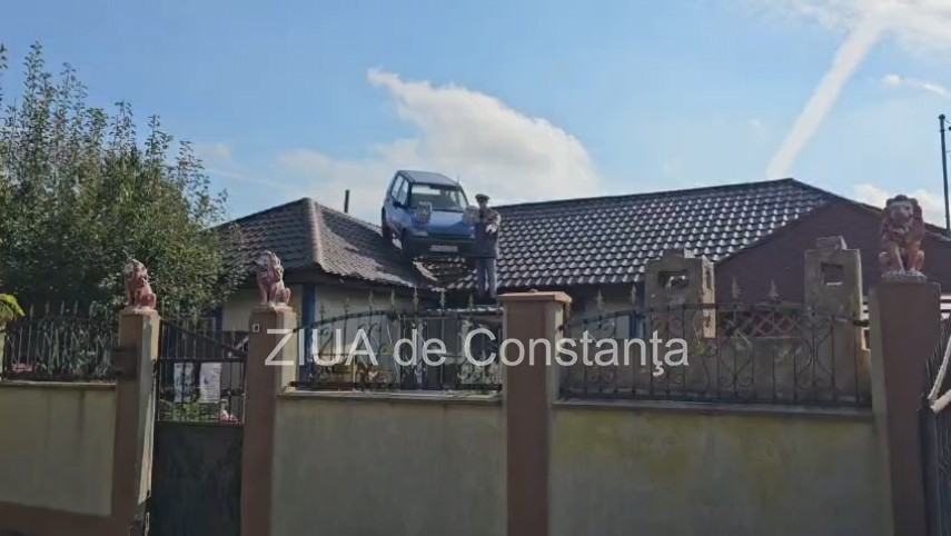 foto video casa din pecineaga judetul constanta cu masina pe acoperis din necesitate intr un punct de foto video casa din pecineaga judetul constanta cu masina pe acoperis din necesitate intr un punct de